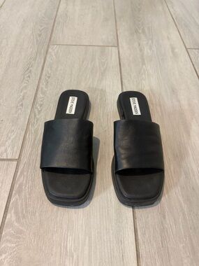 Steve Madden Kaya flat slide sandals in black leather